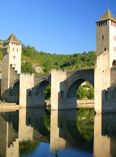Cahors and the Valentré Bridge, a tourist attraction in the Lot region, near Le Bel Air campsite